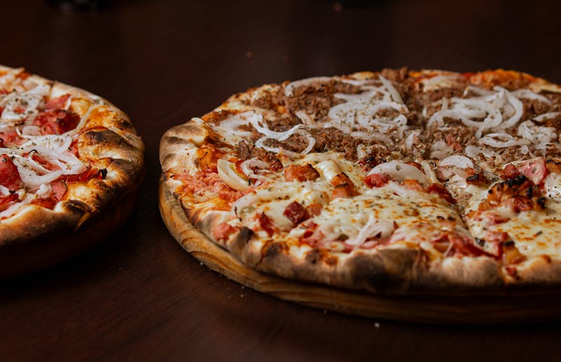 BBQ chicken pizza with red onion and cilantro